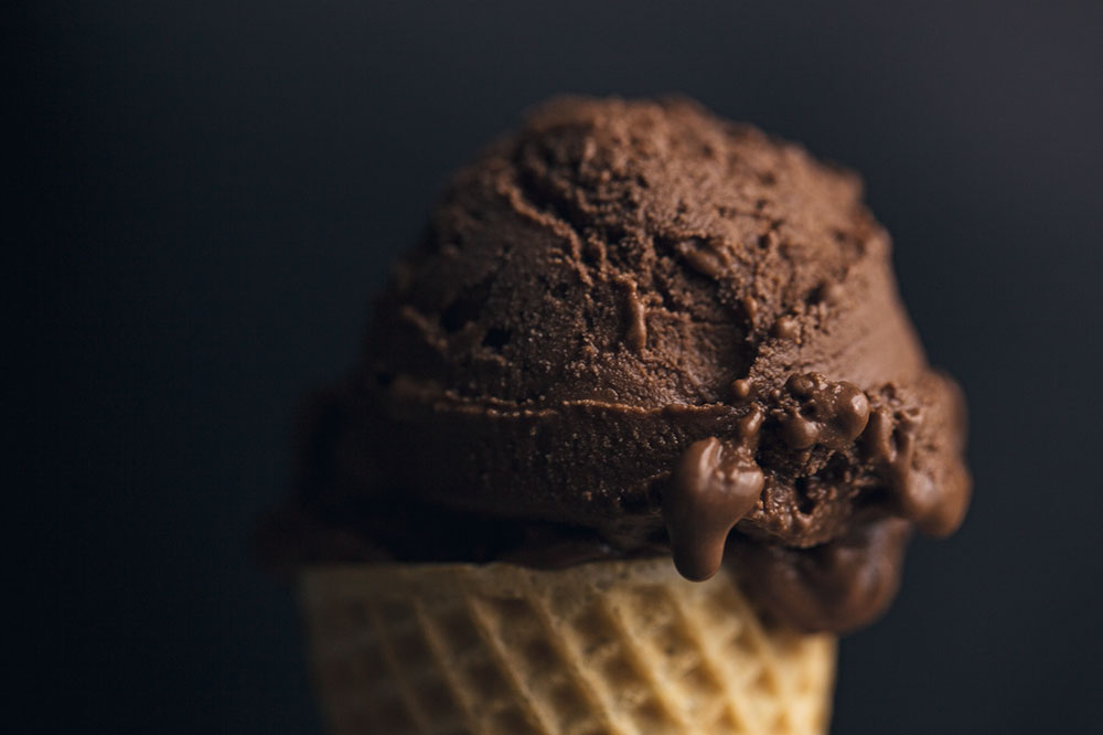 chocolate ice cream scoop on a waffle cone